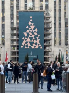 The Rockefeller Centre, Christmas Tree, shrouded the hoarding before the tree is opened
