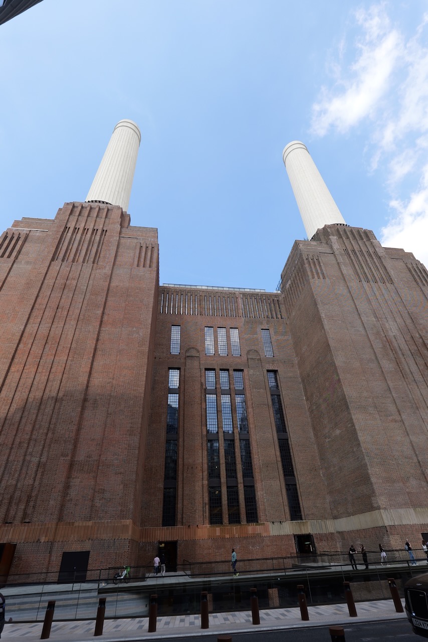 From behind looking up, chimney imposing above us